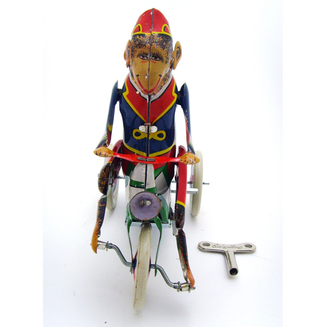Monkey Riding Tricycle