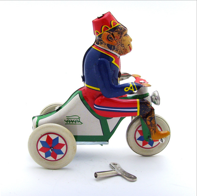 Monkey Riding Tricycle