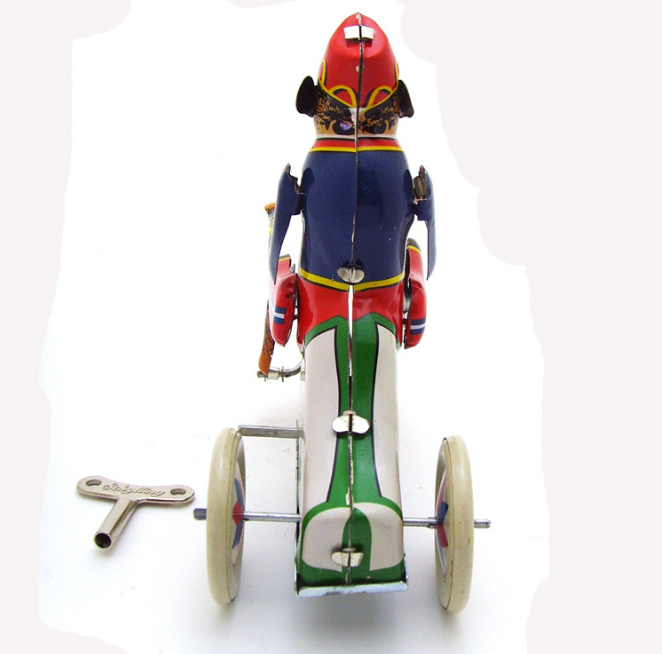 Monkey Riding Tricycle