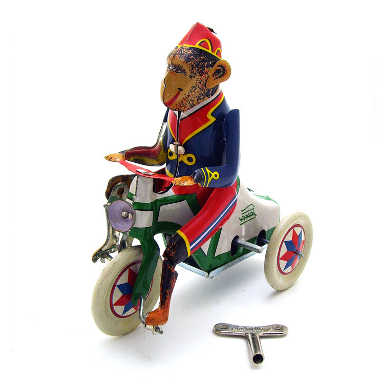 Monkey Riding Tricycle